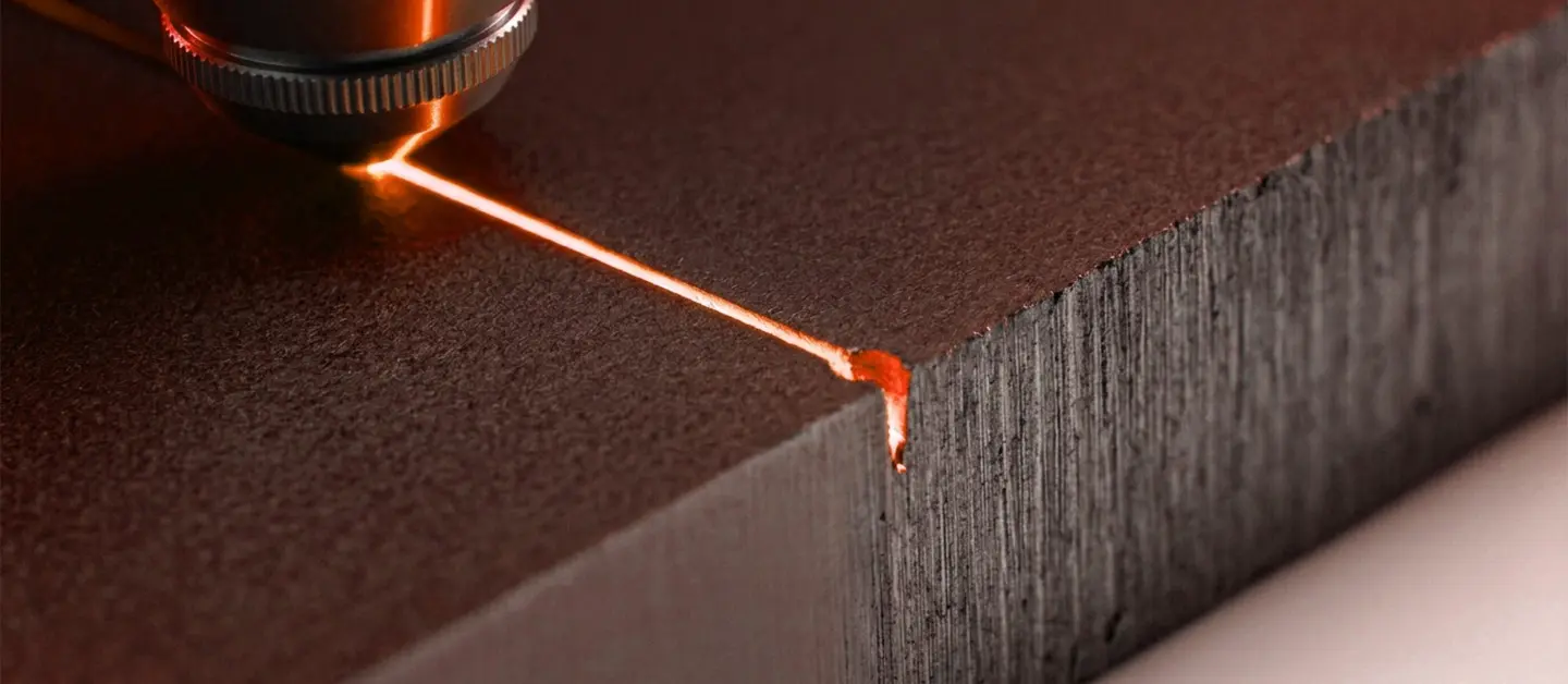 Time-lapse sequence of a laser beam cleanly piercing a thick carbon steel plate without slag splash.